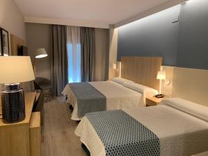 habitación triple - Hotel Puerta del Mar