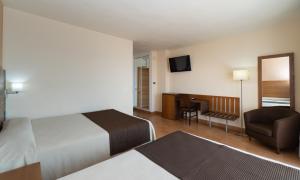 habitación cuádruple (2 adultos + 2 niños) - Hotel Rincón Sol