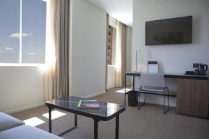 habitación familiar deluxe con cama extragrande - Hotel Riu Plaza España