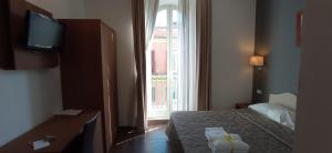 Habitación Doble con balcón - 1 o 2 camas - Rome Travellers Hotel