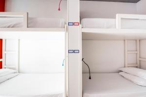 Cama en habitación compartida mixta de 4 camas - Safestay Madrid