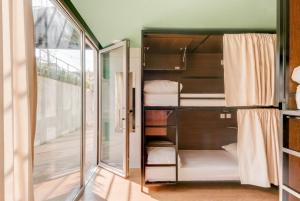 cama en habitación compartida pequeña - Hotel Selina Porto