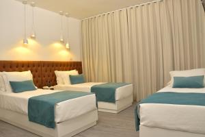 habitación triple - Hotel Sol Algarve by Kavia