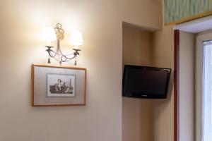 habitación cuádruple - Hotel Suite Ares - Sure Hotel Collection by Best Western