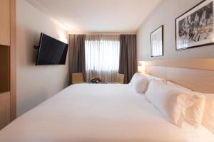 habitación triple deluxe - Suites Plaza Hotel & Wellness