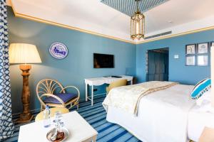 habitación doble deluxe con vistas al mar - The Albatroz Hotel