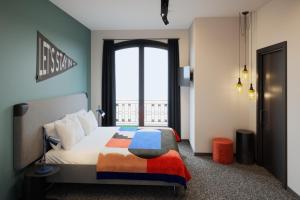 Habitación Deluxe con cama extragrande - The Social Hub Madrid