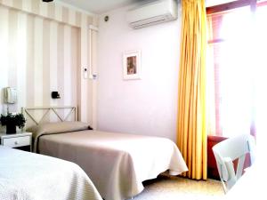 habitación doble - 2 camas (2 adultos + 1 niño) - Hotel Tramontana