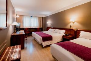 habitación triple - Hotel Tulip Inn Andorra Delfos