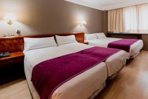 habitación cuádruple - Hotel Tulip Inn Andorra Delfos