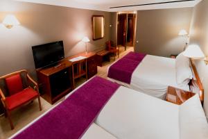 habitación cuádruple - Hotel Tulip Inn Andorra Delfos
