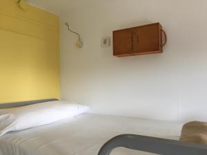 cama en habitación compartida mixta de 10 camas - Hotel Utopia Beach House