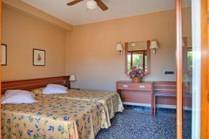 habitación doble con cama supletoria - 1 o 2 camas (2 adultos + 1 niño) - Hotel Vista Alegre