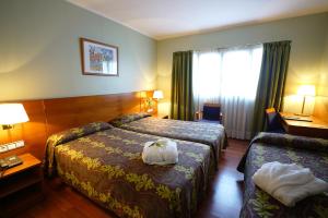 habitación triple (2 adultos + 1 niño) - Hotel Zenit Diplomatic